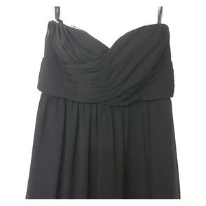 Black floor length dress.