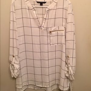 white blouse with thin navy pattern