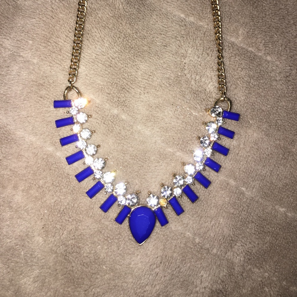 Blue gem, diamond, and gold necklace