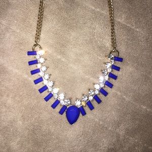Blue gem, diamond, and gold necklace
