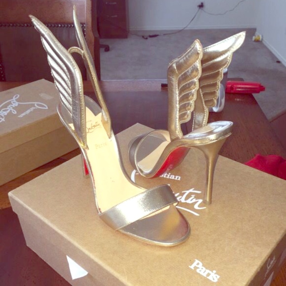 Christian Louboutins Gold wings size 38