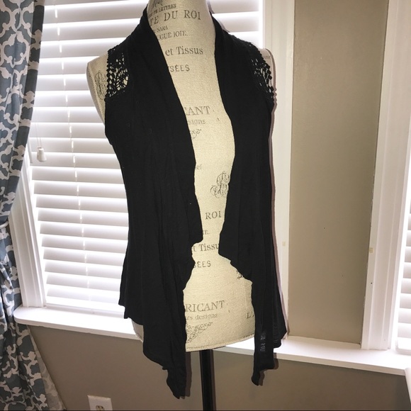 black flowy vest