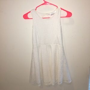 white, flowy, mini dress with circular lace