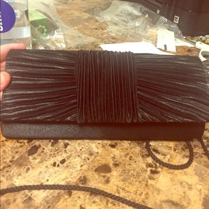 Black satiny clutch