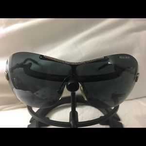 Miu miu Sun glasses.  Open to offers!!!