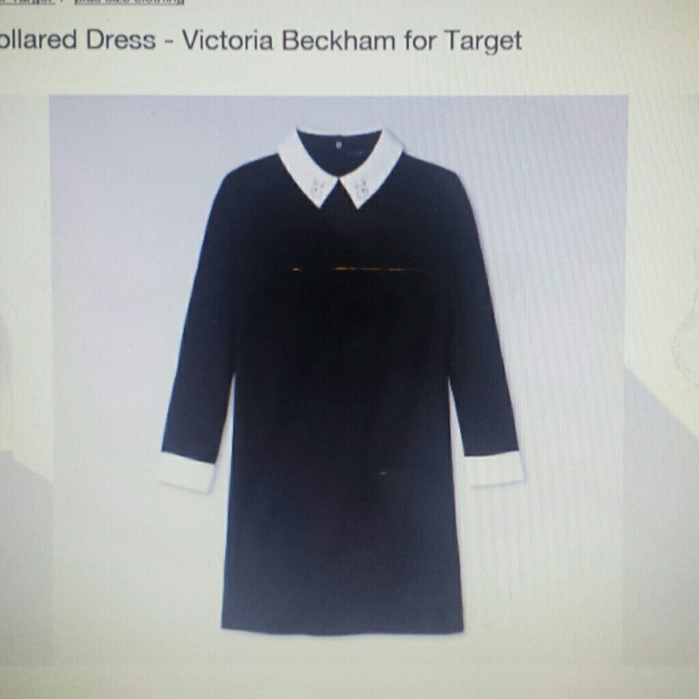 Victoria Beckham black collared dress  is chic