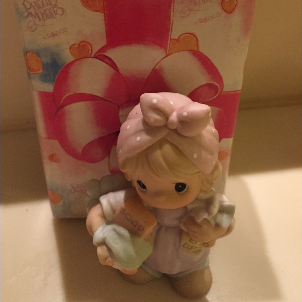 Small precious moments statue