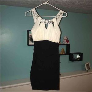 Black and white above the knee dress