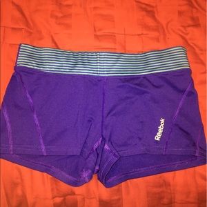 REEBOK play dry blue booty shorts