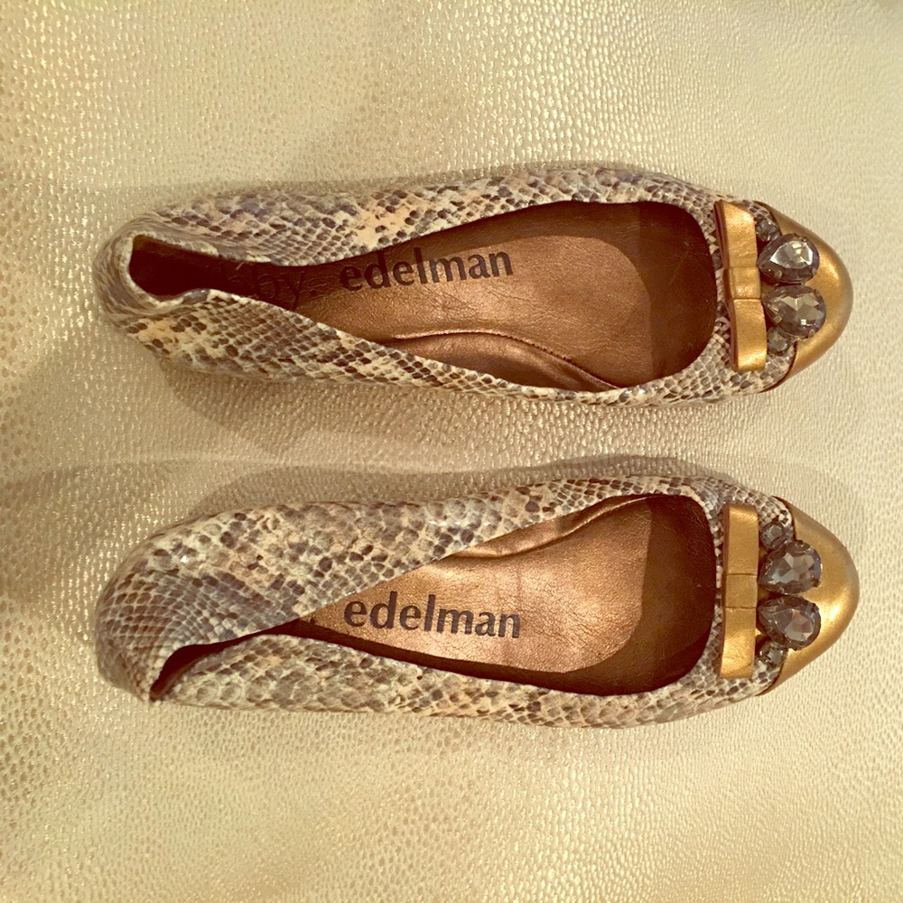 Snakeskin and gold flats