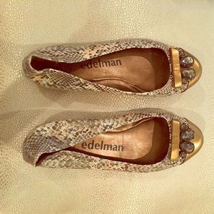 Snakeskin and gold flats