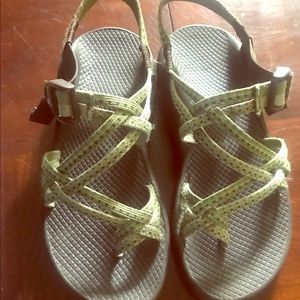 Green 2 strap chacos with brown soles