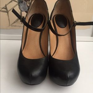 Black leather Mary Jane's