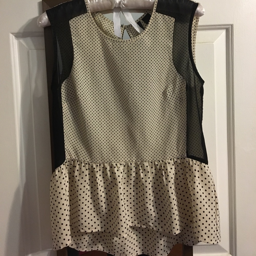 Polka Dot sheer blouse with ruffle bottom