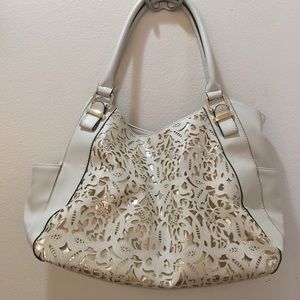 Apt 9 laser cut purse