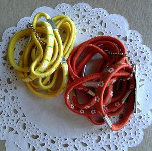 Yellow and orange flower hair ties