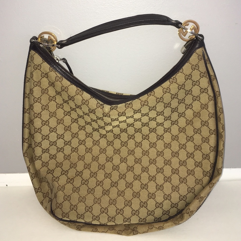 Authentic Gucci hobo in monogram fabric canvas