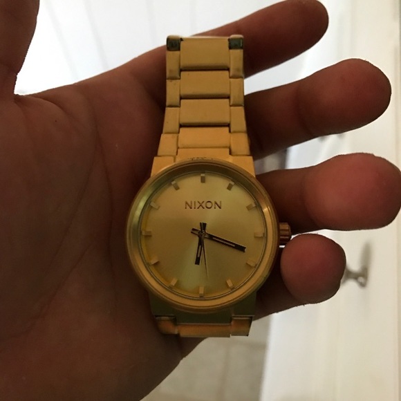Gold nixon watch