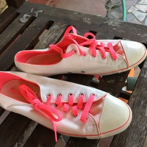 White and hot pink converse low top shoes