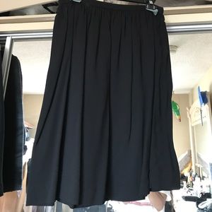 Black pleated Prada skirt