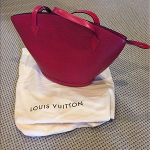 Vintage red Louis Vuitton bag.