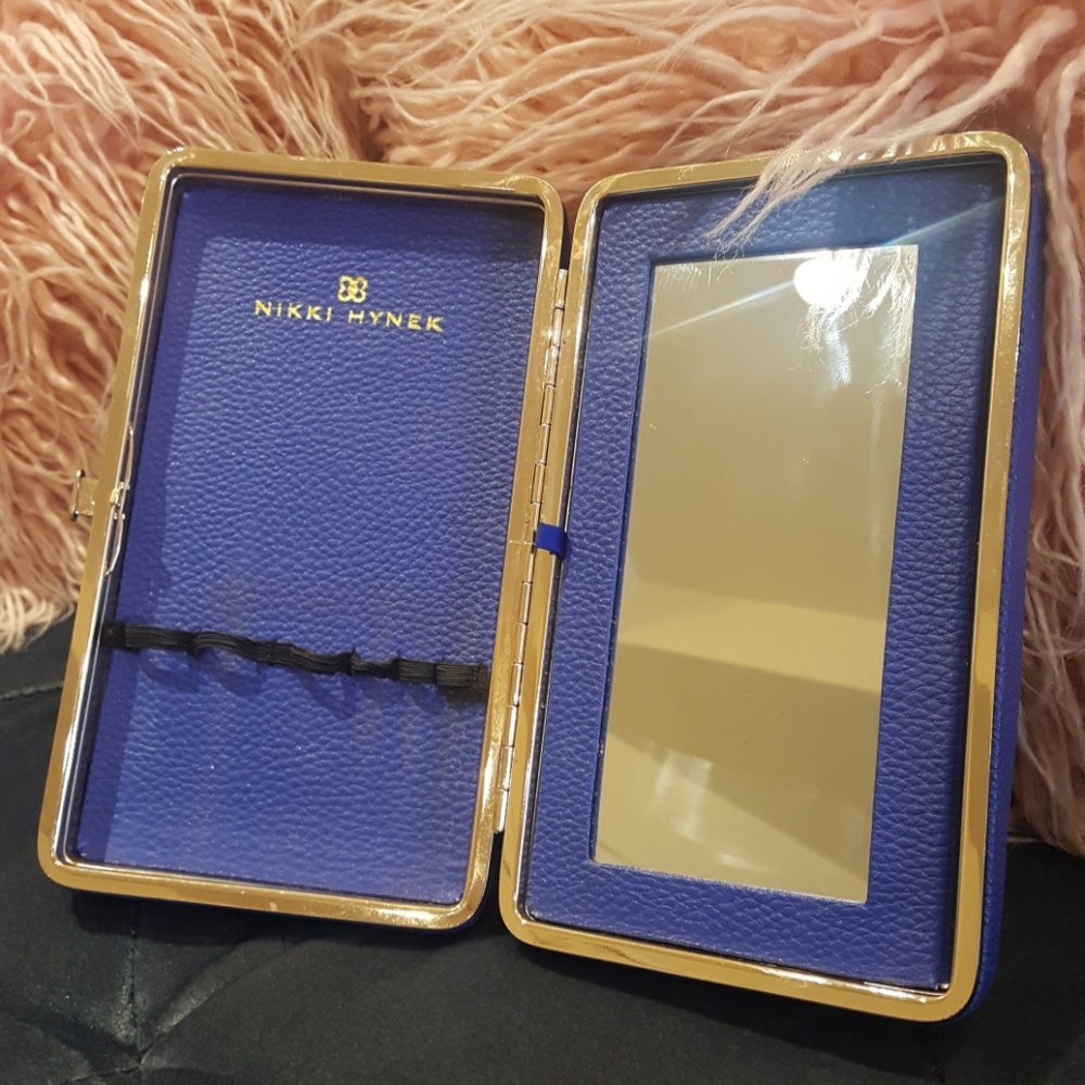Makeup vanity travel clutch with mirror