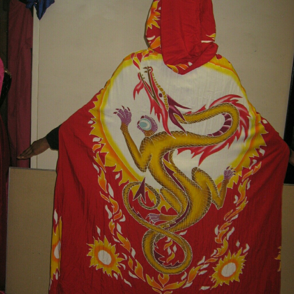 Colorful cape shows a dragon flying to the sun