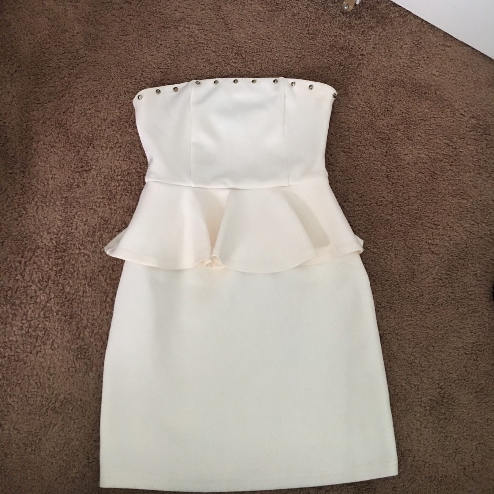 Cream strapless peplum dress