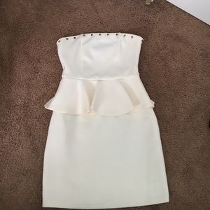 Cream strapless peplum dress