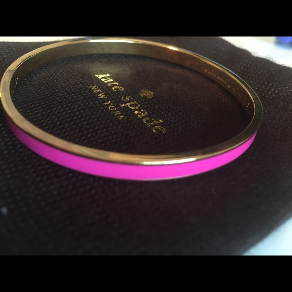 Never worn hot pink and gold Kate spade bracelet