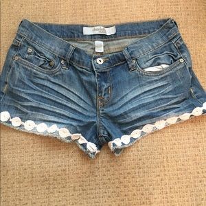 Floral trim denim shorts