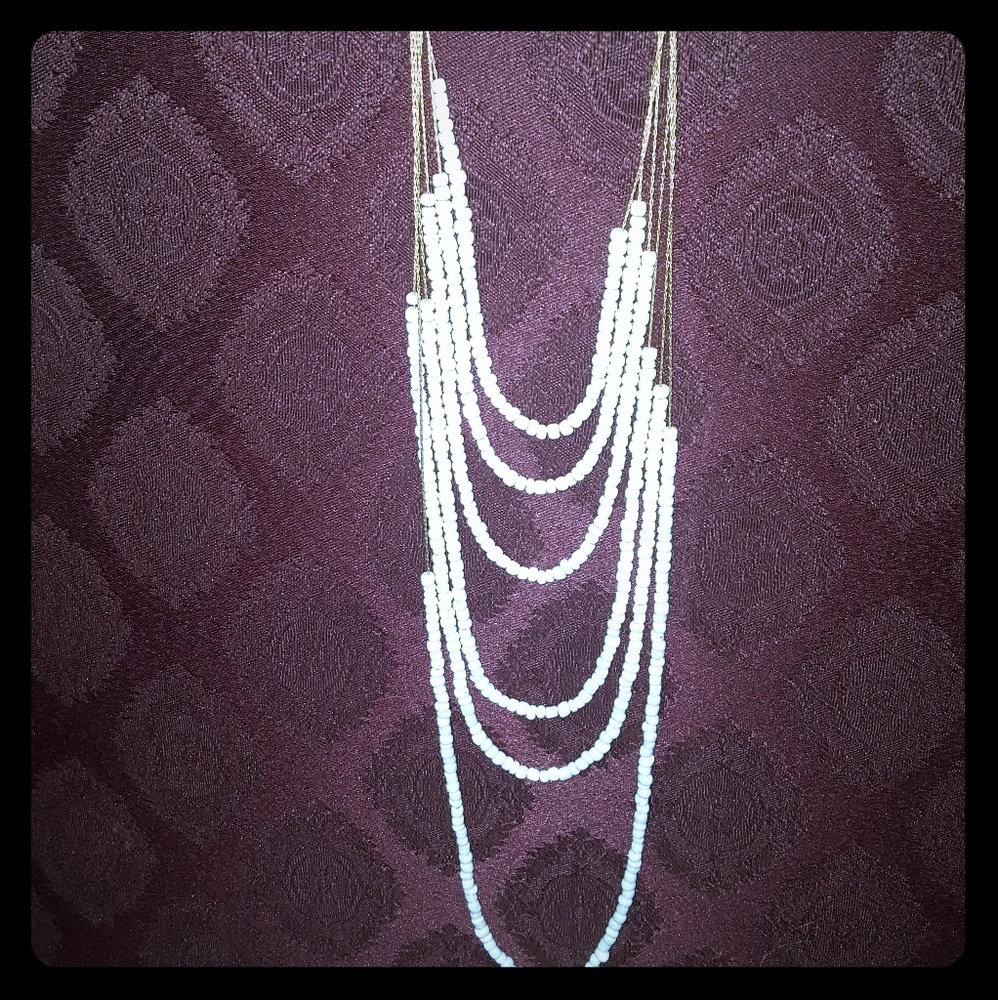 Long white beaded neckless