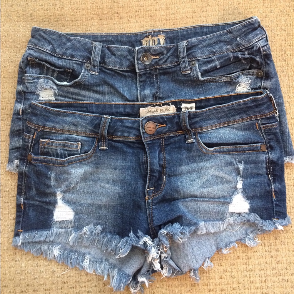 Two ripped denim shorts