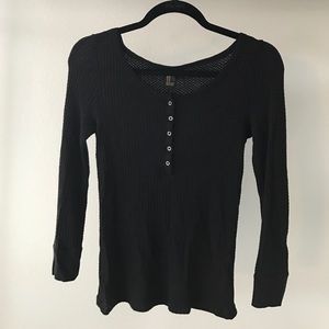 Black, long-sleeve tee.