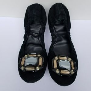 Black Tory Burch flats.