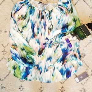 Jennifer Lopez bright colored  blouse