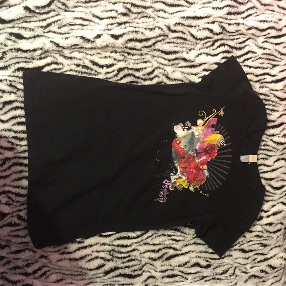 A small woman's Element T-shirt