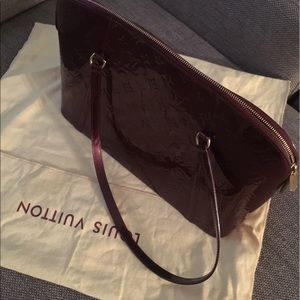 Louis Vuitton patten leather tote. Color burgundy