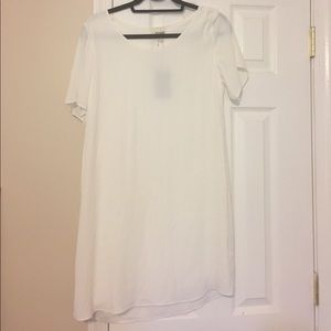 White dress, fully lined with pockets