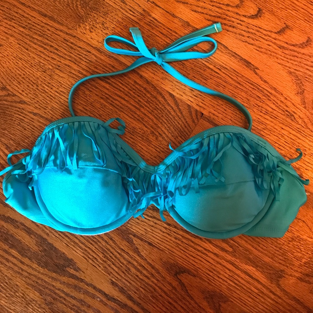 Bright blue push up swimsuit top with fringe