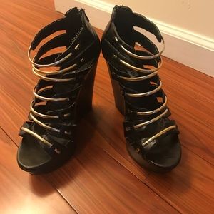 Black and gold Steve Madden wedges
