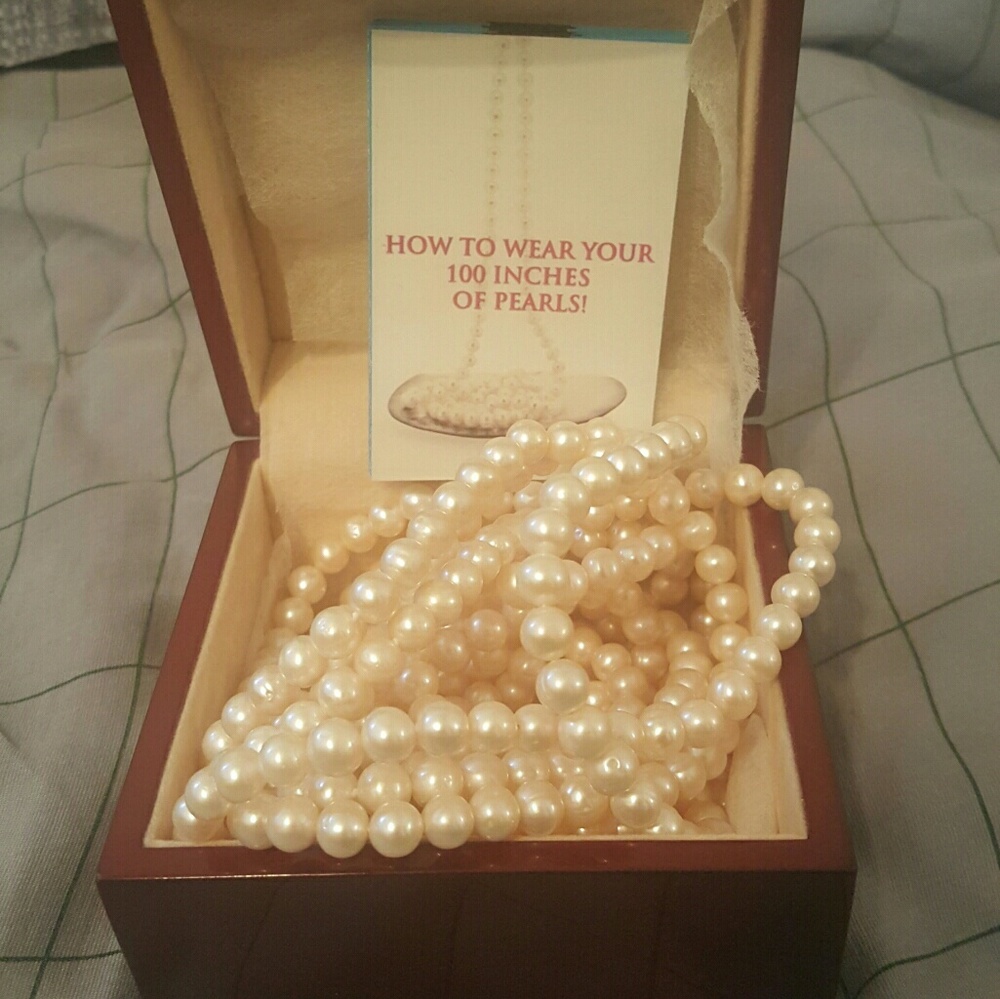 100" cultured pearls