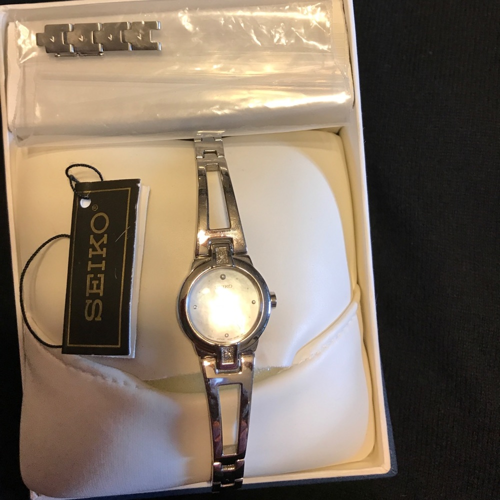 Seiko watch with light blue watch face