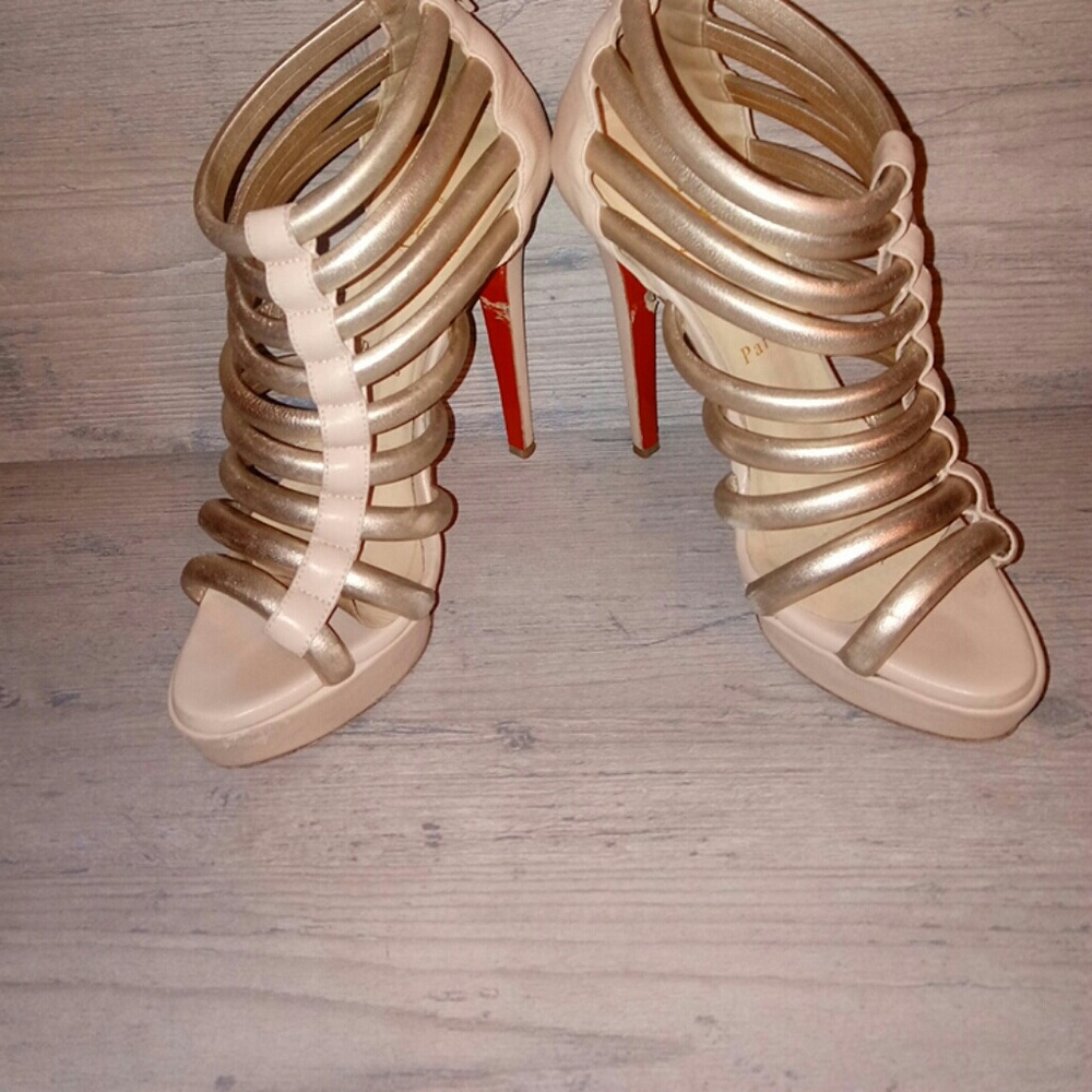 Women's Christian Louboutin gold heels. Size 6.5