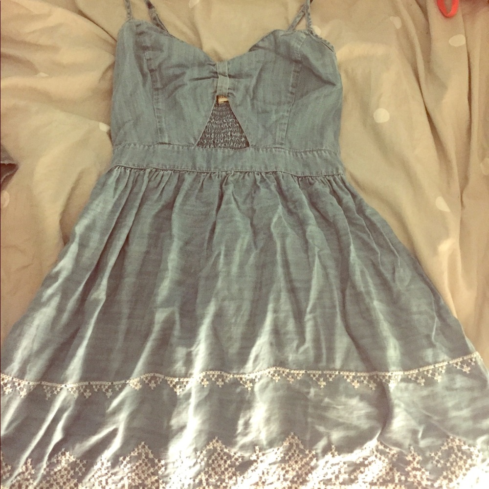 Very cute denim sundress with white embroidery