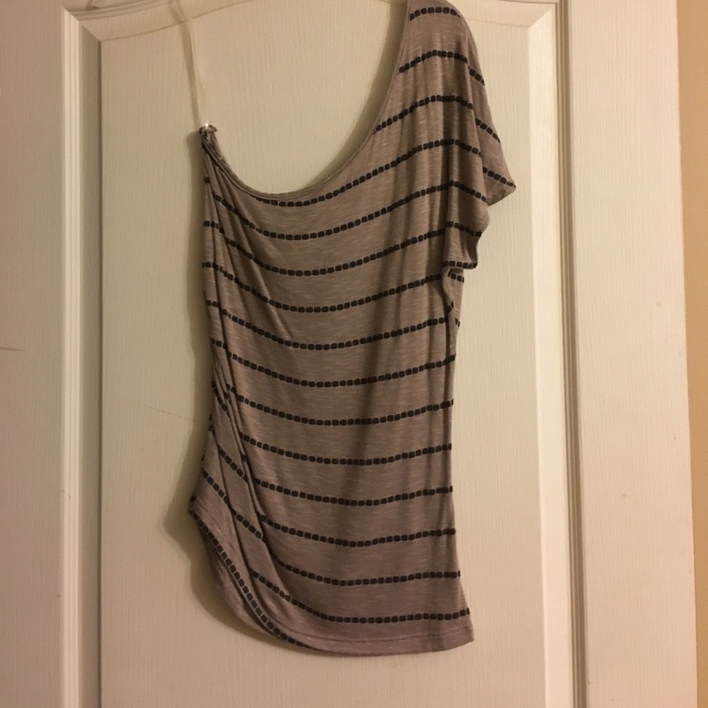 One shoulder top. Super cute. Never worn.