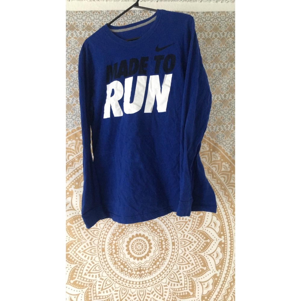 Blue Nike shirt