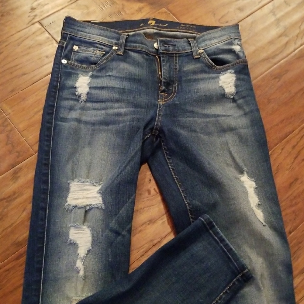 7 For All Mankind distressed skinny jeans.