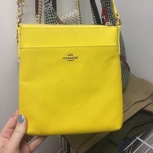 Yellow coach north south swingpack