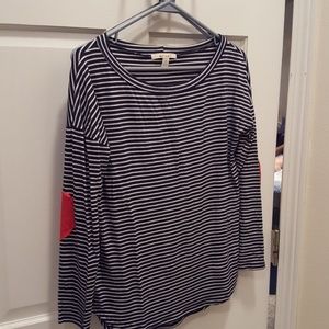 Shirt with heart shaped elbow patches